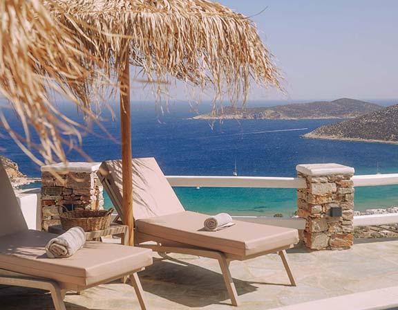 The pool area with sea view at Pelagos Residence